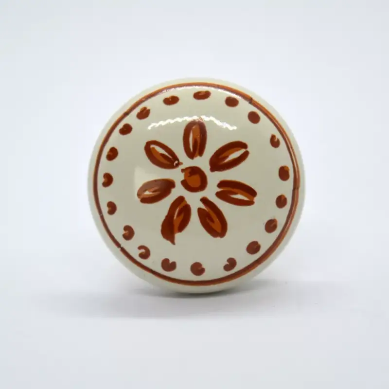 Fém-porcelán bútorgomb, bézs - bronz színű, barna virág mintával Rendeld meg most
