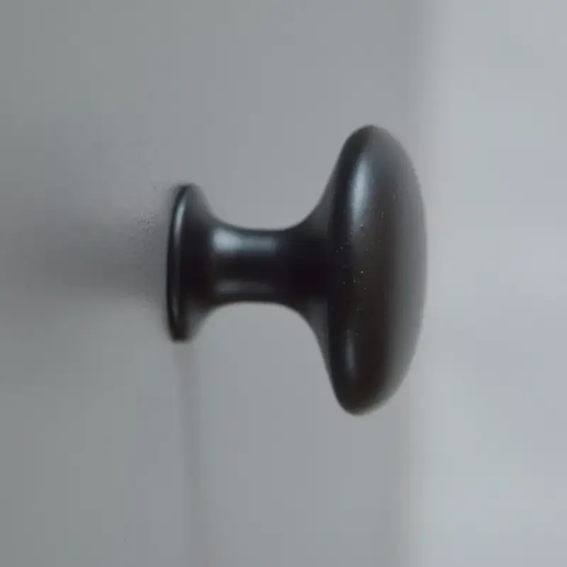 Fém bútorgomb, matt fekete színű, 29 mm átmérő Akció