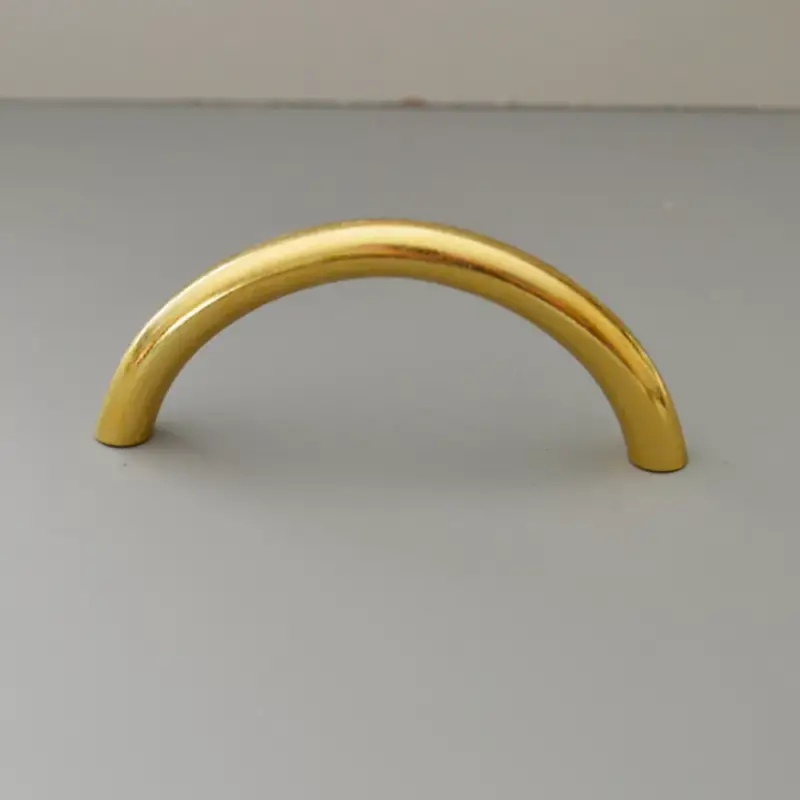 Fém bútorfogantyú, fényes arany színű, 64 mm furattávval, 2. osztályú Exkluzív ajánlat