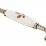 Korlátozott ajánlat Porcelán-fém bútorfogantyú, antik bronz-barna virággal, 96 mm furattávval
