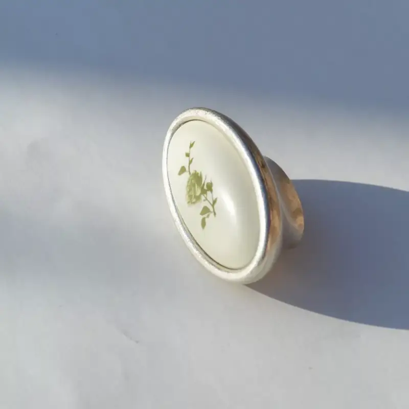 Kedvezményes ár Metall-Kunststoff-Möbelgriff, versilbert, grünes Blumenmuster, 16 mm BA