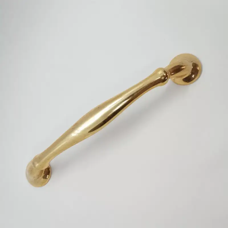 Árengedmény Kunststoff-Möbelgriff, goldfarben glänzend, 128 mm BA
