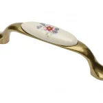 Ne maradj le Porzellan-Metall-Möbelgriff, bronze-braun Blumenmotiv, Bohrung 96 mm
